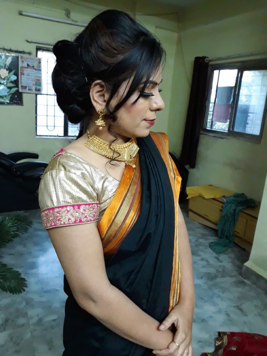 Beautiful bride in burgundy Kanjivaram saree with gold jewellery — Shrungar bridal makeover Ravet Pune